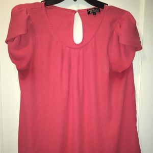 Coral colored tulip sleeves top